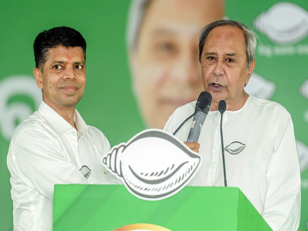 BJD leader VK Pandian with Odisha Chief Minister Naveen Patnaik (File Photo/ANI)