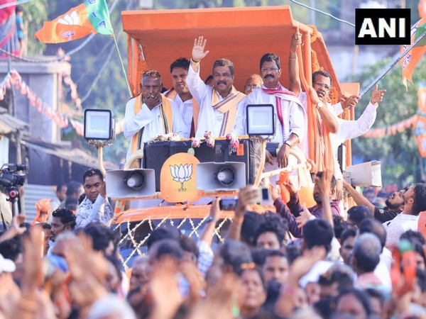 Union Minister Dharmendra Pradhan during a roadshow in Athmallick (Photo/ANI)