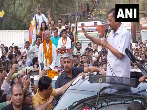 Delhi CM Arvind Kejriwal addressing poll rally in Delhi (Photo/@BJP4Delhi)
