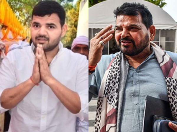 BJP candidate Karan Bhushan Singh (left) with Kaiserganj sitting MP Brij Bhushan Singh. (Photo/ANI)