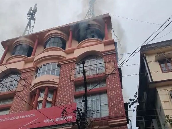 Fire breaks out at building in Silchar on Saturday. (Photo/ANI)