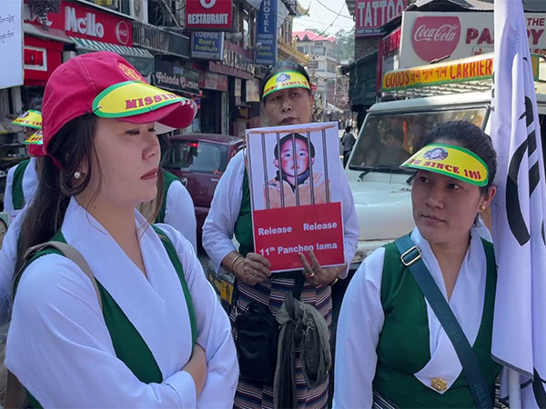 Tibetans rally for 11th Panchen Lama's release. (Photo: ANI)