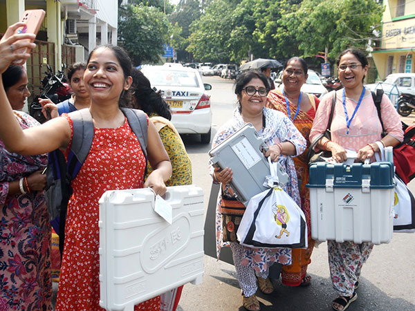 Polling officials leave for their respective polling stations carrying election materials on the eve of fifth phase of Lok Sabha polls (Image/ANI)