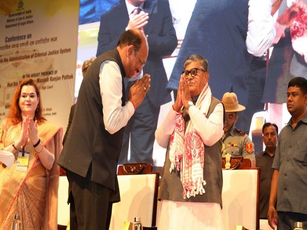 Assam Governor Gulab Chand Katria and Law Secretary Rajeev Mani greeting Gov Gulab Chand Kataria (Photo/ANI)