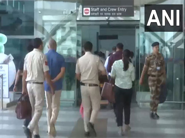 Delhi Police with Bibhav Kumar at Delhi Airport (Photo/ANI)