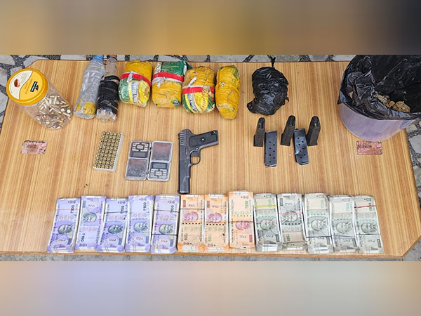 Tarn Taran Police in a joint operation with BSF seize money and weapons on Tuesday. (Photo/ANI)