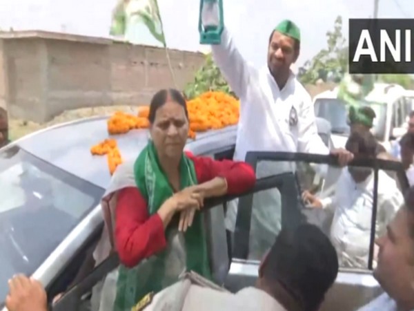 Former CM of Bihar Rabri Devi along with RJD leader Tej Pratap Yadav. (Photo/ANI)