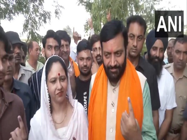 Haryana Chief Minister Nayab Singh Saini, wife cast vote in Mirzapur (Photo/ANI)