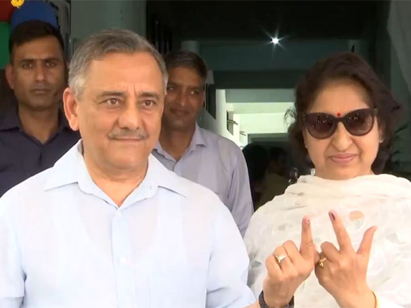 Chief of Defence Staff (CDS) Gen Anil Chauhan with his wife after casting vote in Delhi (Photo/ANI)