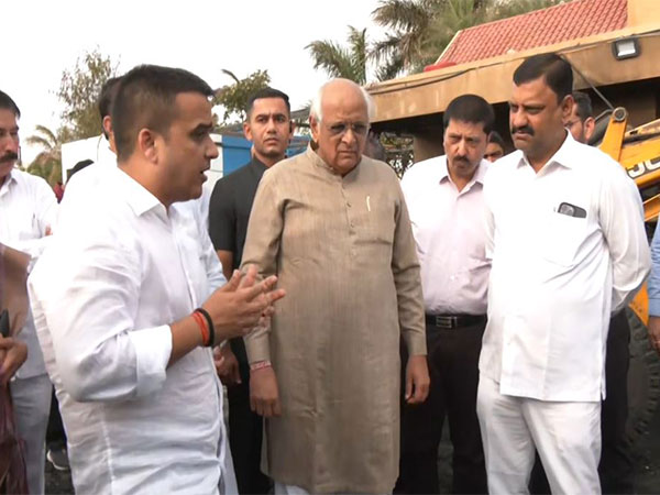 Gujarat CM Bhupendra Patel along with his Harsh Sanghavi (Photo/ANI)