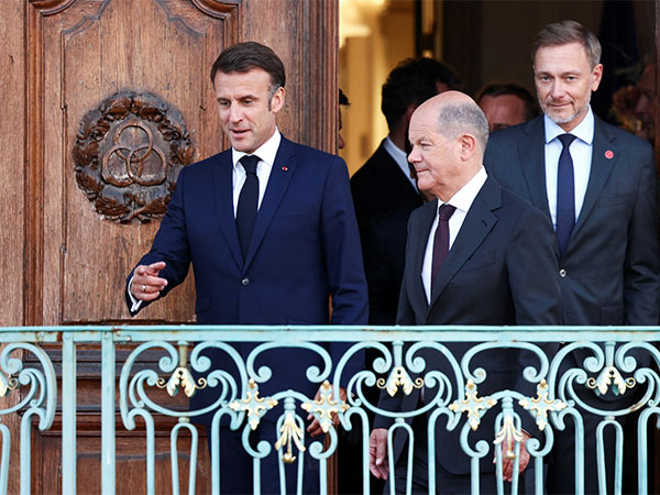 German Chancellor Olaf Scholz with French President Emmanuel Macron during a Franco-German working session in Berlin (Photo/Reuters)