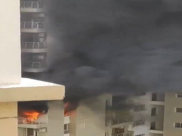 Fire breaks out at Lotus Boulevard Society in Sector 100 (Photo/ANI)