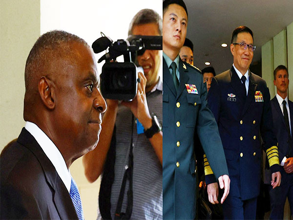 US Defence Secy Llyod Austin (right) and Chinese Defence Minister Dong Jun arrives for a US-China bilateral meeting on sidelines of Shangri-La Dialogue in Singapore [Photo credit/Reuters]