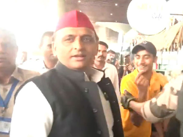 SP chief Akhilesh Yadav at Lucknow Airport. (Photo/ANI)