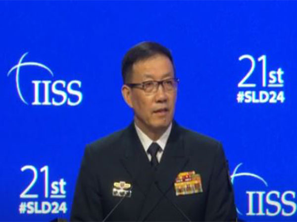 China's Minister of National Defence Admiral Dong Jun delivers address at Shangri-La Dialogue (Image Credit: YouTube/IISS)