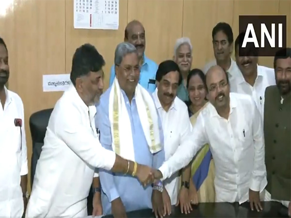 Congress leaders accompanied by Karnataka Chief Minister Siddaramiah and Deputy Chief Minister DK Shivakumar arrive at Vidhana Soudha in Bengaluru (Photo/ANI)