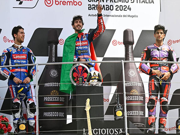Ducati Lenovo Team's Francesco Bagnaia (In Centre) at podium after winning Italian MotoGP (Image: MotoGP) 