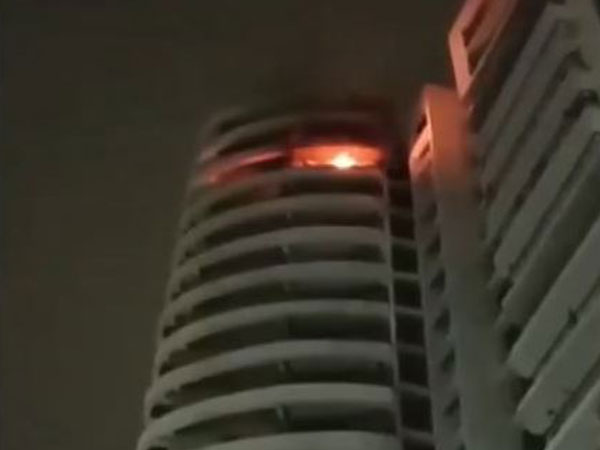 Fire breaks out due to short circuit at apartment in Noida (Photo/ANI)