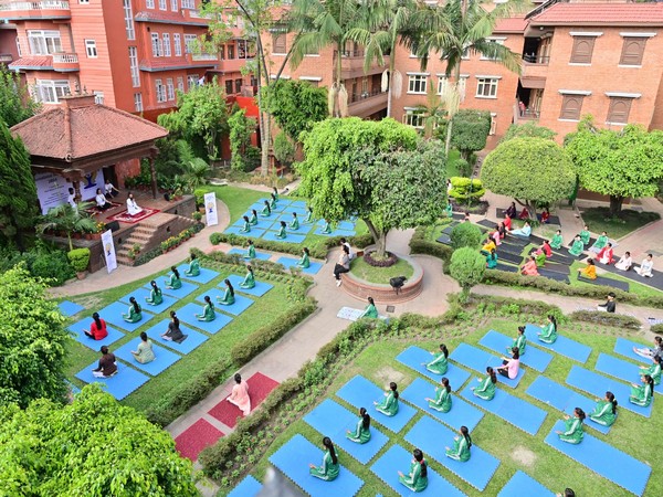Yoga session being held on the premises of Kathmandu Temple
