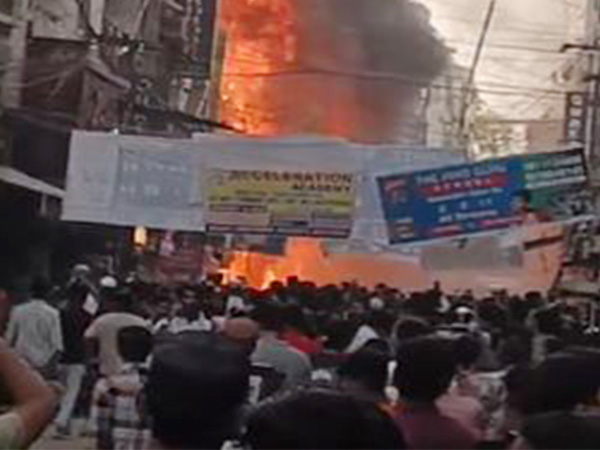 Locals gather after a fire broke out at Shaheen Bagh, New Delhi. (Pic credit/ Fire department)
