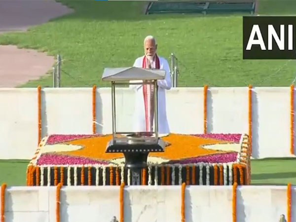 PM Modi offers tribute to Mahatma Gandhi at Rajghat (Photo/ANI)