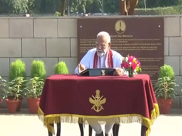 PM-elect Narendra signs visitor's book (Image/ ANI)