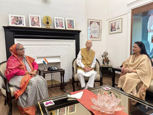 Prime Minister Sheikh Hasina of Bangladesh calls on veteran BJP leader LK Advani in New Delhi on Sunday (Photo/ANI)