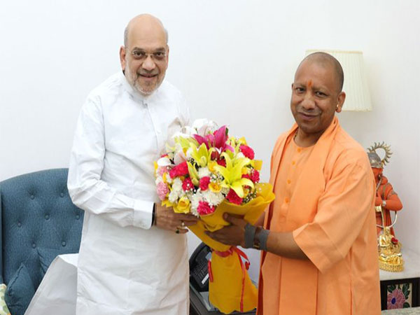 Yogi Adityanath meets Union Minister Amit Shah (Photo/ANI)