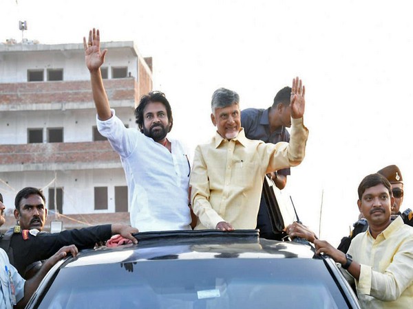 Janasena Party chief Pawan Kalyan and TDP supremo N Chandrababu Naidu during a roadshow. (File Photo/ANI)