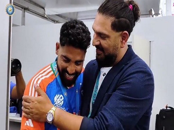Yuvraj Singh presenting the medal to Siraj. (Photo- BCCI website)