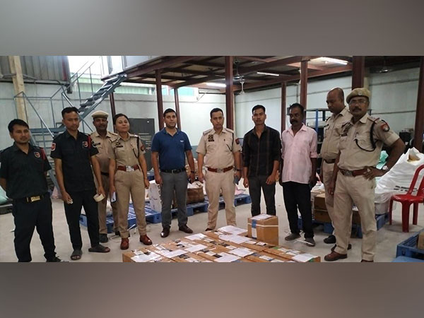 Guwahati Police with the seized consignment of Codeine Phosphate Syrup