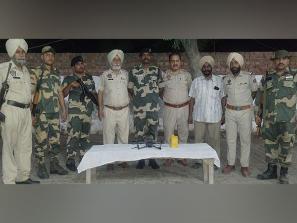 BSF and Punjab police with the recovered drone and narcotics. (Photo/X)