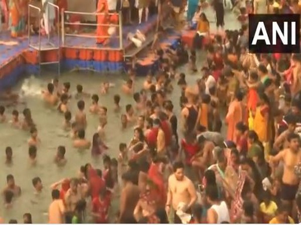 Devotees take holy dip at Varanasi's Dashashwamedh Ghat on Ganga Dussehra (Photo/ANI)