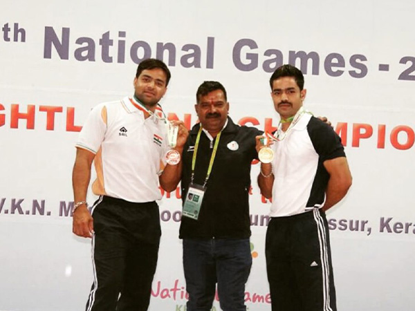 Budhram Sarang with his two sons Ajaydeep Sarang and Rustom Sarang (Photo: ANI)