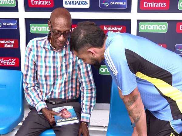 Wes Hall and Virat Kohli (Photo/ANI)