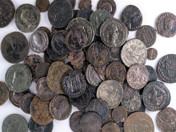 A hoard of silver and bronze coins found in the foundations of a Roman Era building (Photo/TPS)