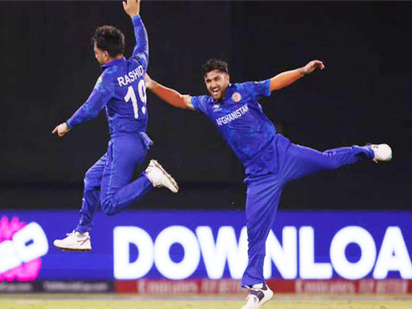 Fazalhaq Farooqi celebrating with Rashid Khan. (Photo- ICC)