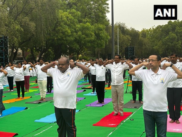 HD Kumaraswamy performs yoga on International Day of Yoga. (Photo/ANI)
