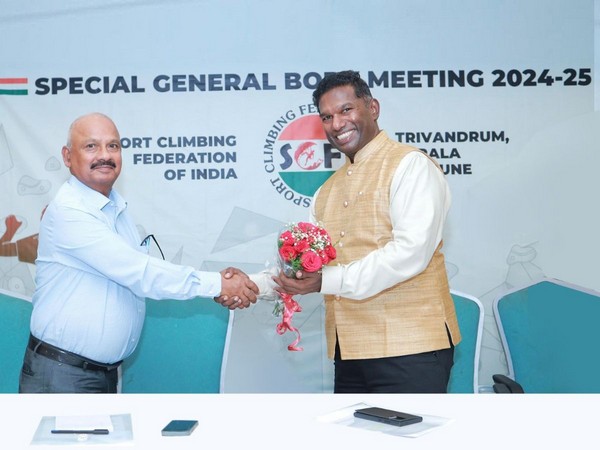 The newly appointed SCFI president Dr Rajmohan Pillai, Chairman,Beta Group, being congratulated by Brigadier Yadav, Vice President, SCFI.