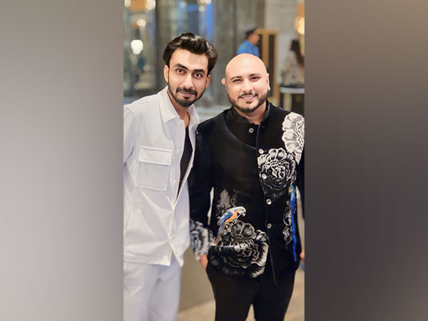 Anant Raj Verma and B Praak smiled for the camera at a hotel foyer in Gurugram