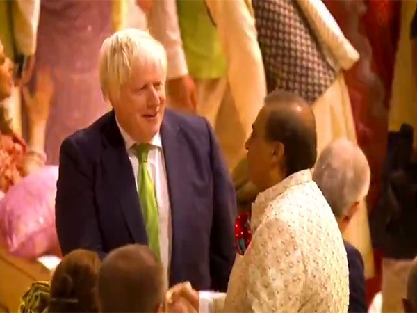 Former UK PM Boris Johnson with Reliance Industries Chairman Mukesh Ambani. (Photo: ANI)