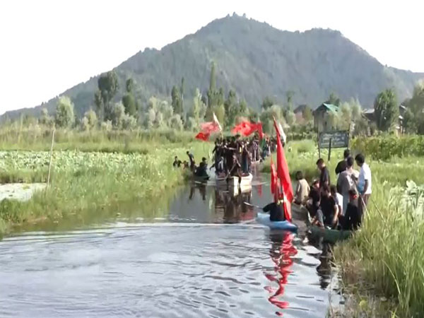 Traditional Muharram procession carried out on Dal lake in J-K's Srinagar (Photo/ANI)