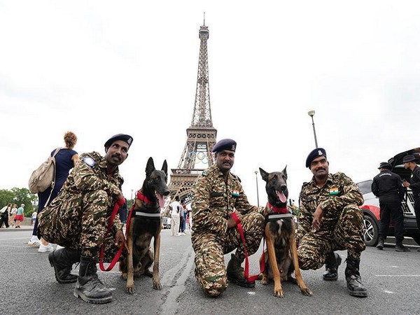 CRPF soldiers with dogs (Photo: ANI)