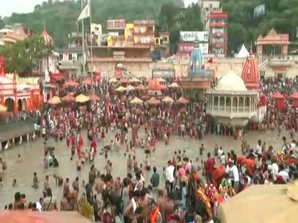 Devotees at Haridwar in Uttarakhand taking a holy dip in the Ganga River. (Photo/ANI)