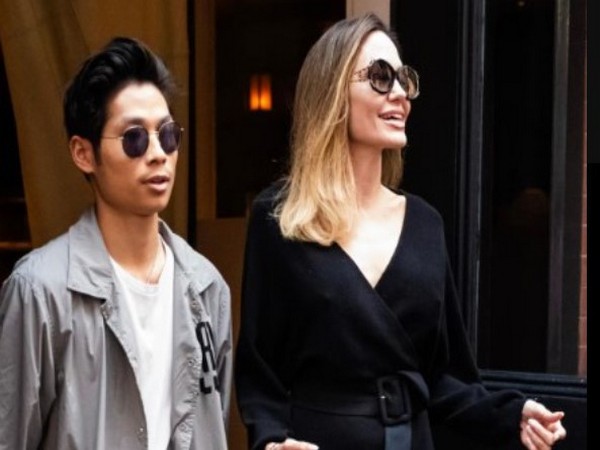 Angelina Jolie with son Pax (image source: X)