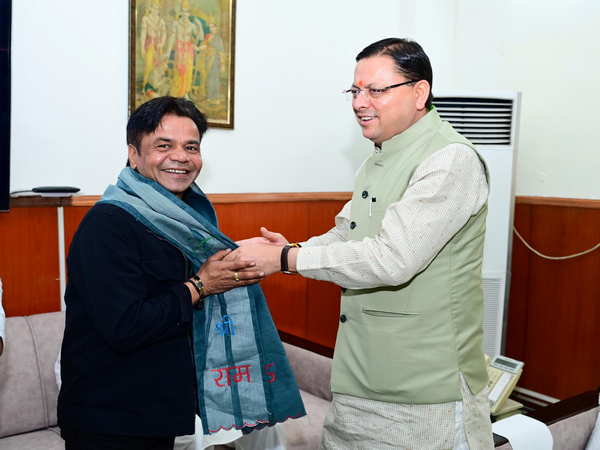 Rajpal Yadav meets Uttarakhand CM Pushkar Singh Dhami . (Photo/ANI)