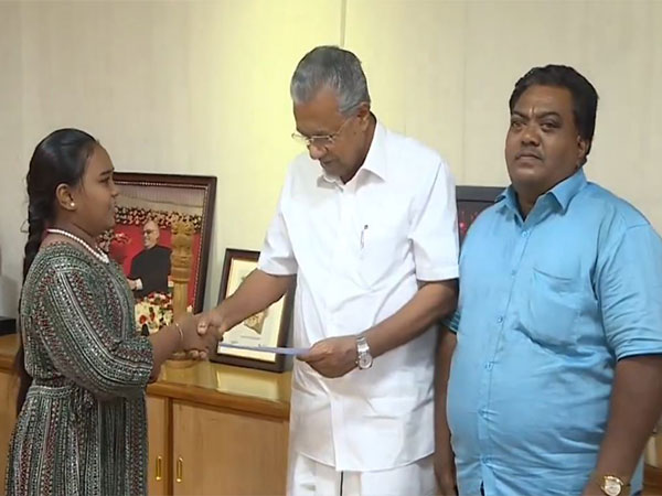 Harini Sri with Kerala Chief Minister Pinarayi Vijayan (Image/ANI)
