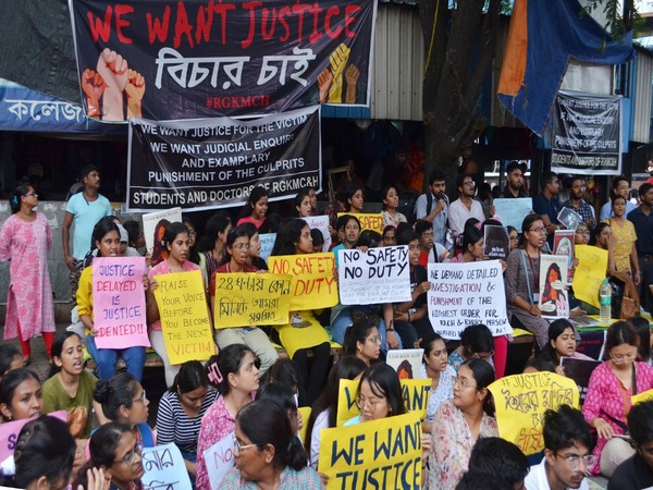 Junior doctors, nurses and medical staff protest at the gate of RG Kar Medical College and Hospital in Kolkata. (Photo/ANI)