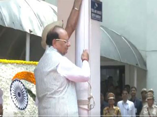 Delhi LG hoisting national flag at his official residence on the occasion of Independence Day. (Photo/ANI)