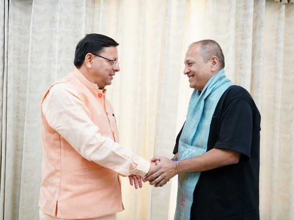 Vipul Amrutlal Shah meets Uttarakhand CM Pushkar Singh Dhami (Image source/ANI) 